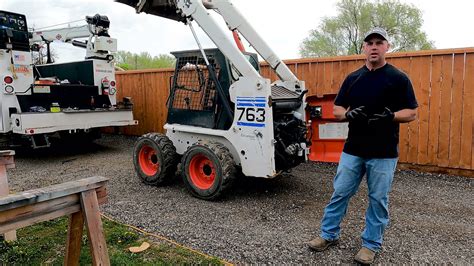 skid steer into a pickup|Minimum requirement for pulling a 763 .